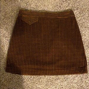 a mini Brown and black corduroy skirt